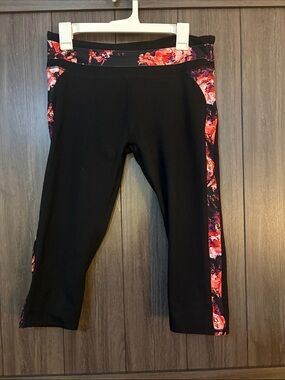 Fabletics Black Capri Leggings with Red Floral Side Panels. Size Large